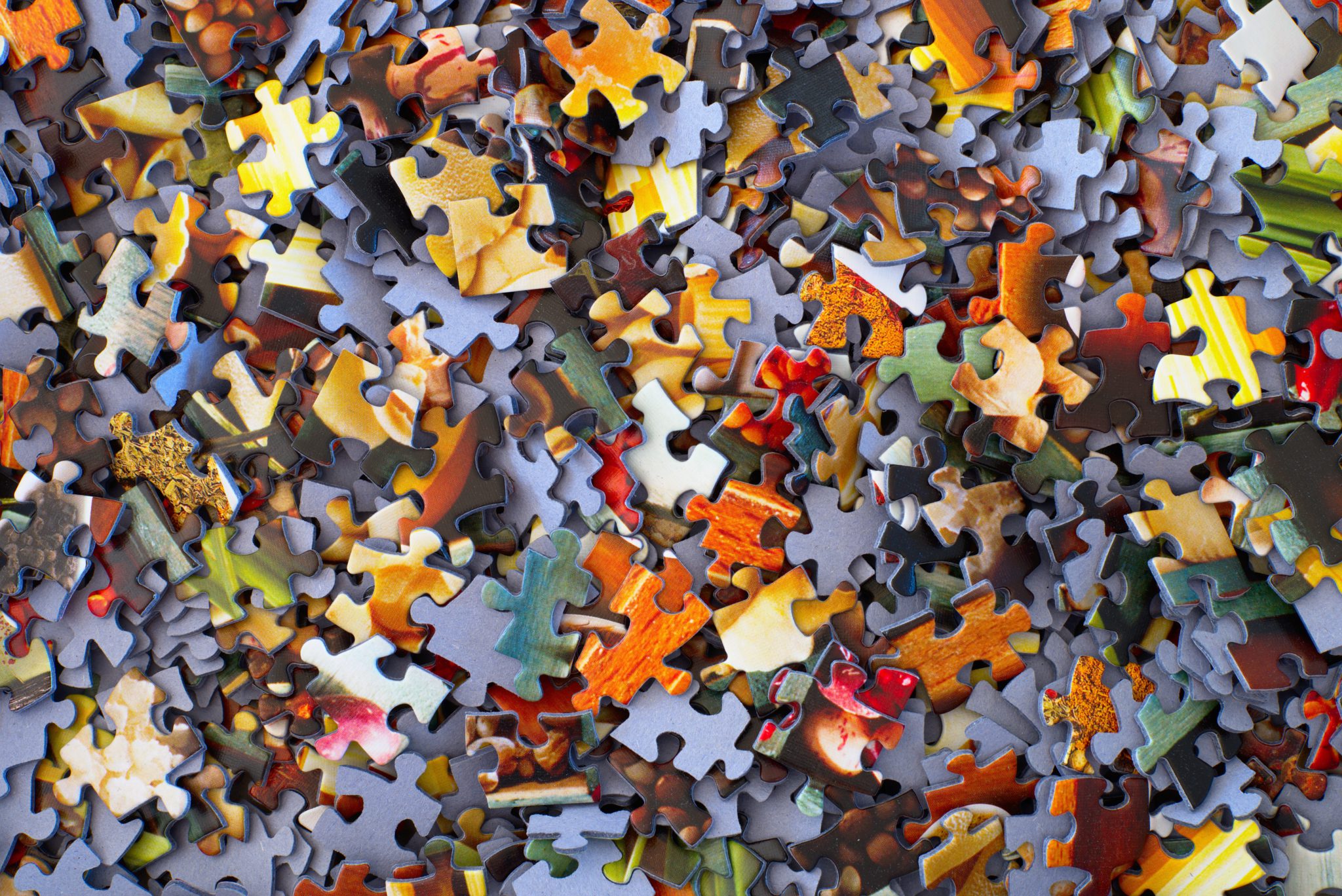 A pile of jigsaw pieces